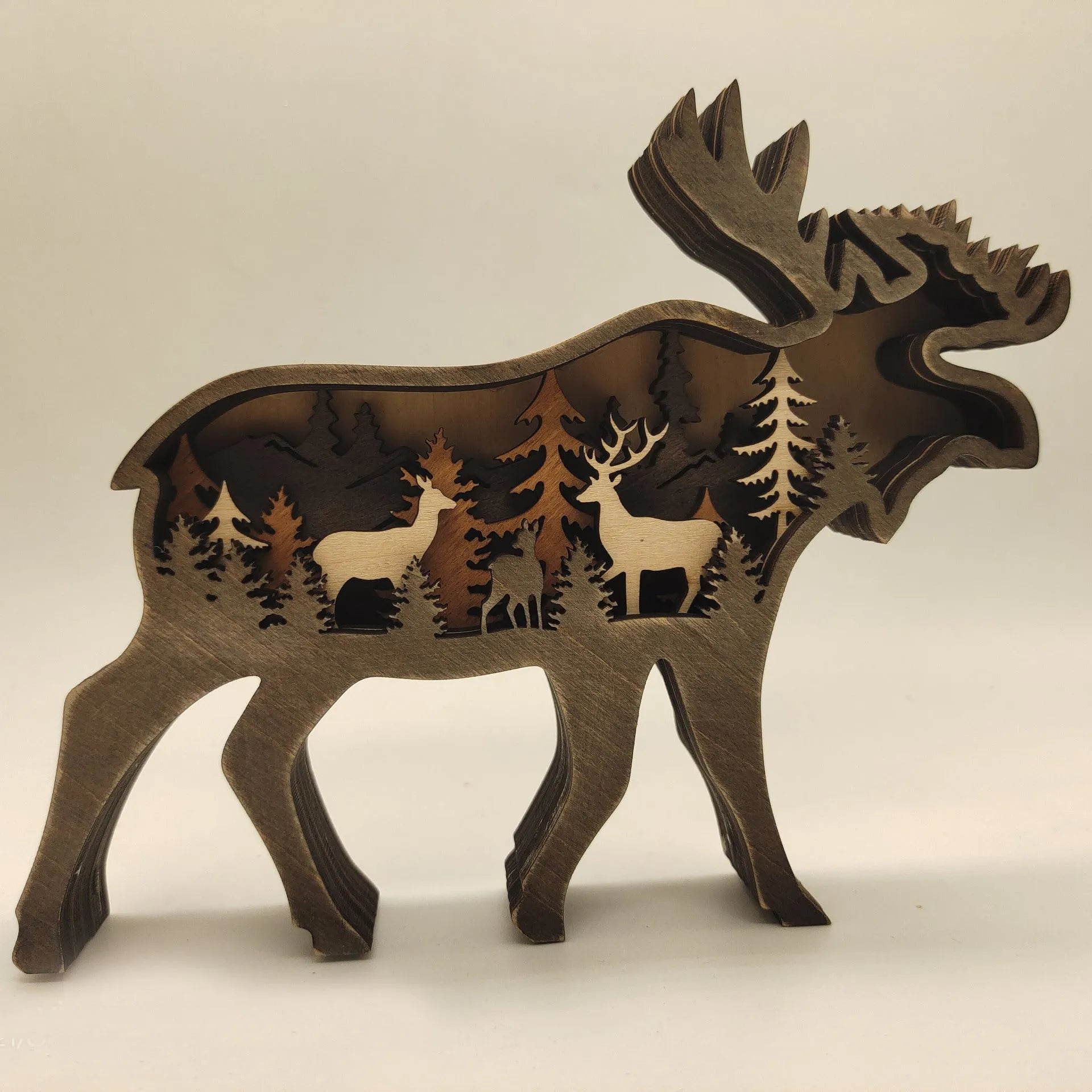 Boxwood elk ornament 18cm tall with antlers, natural wood finish, on a tabletop