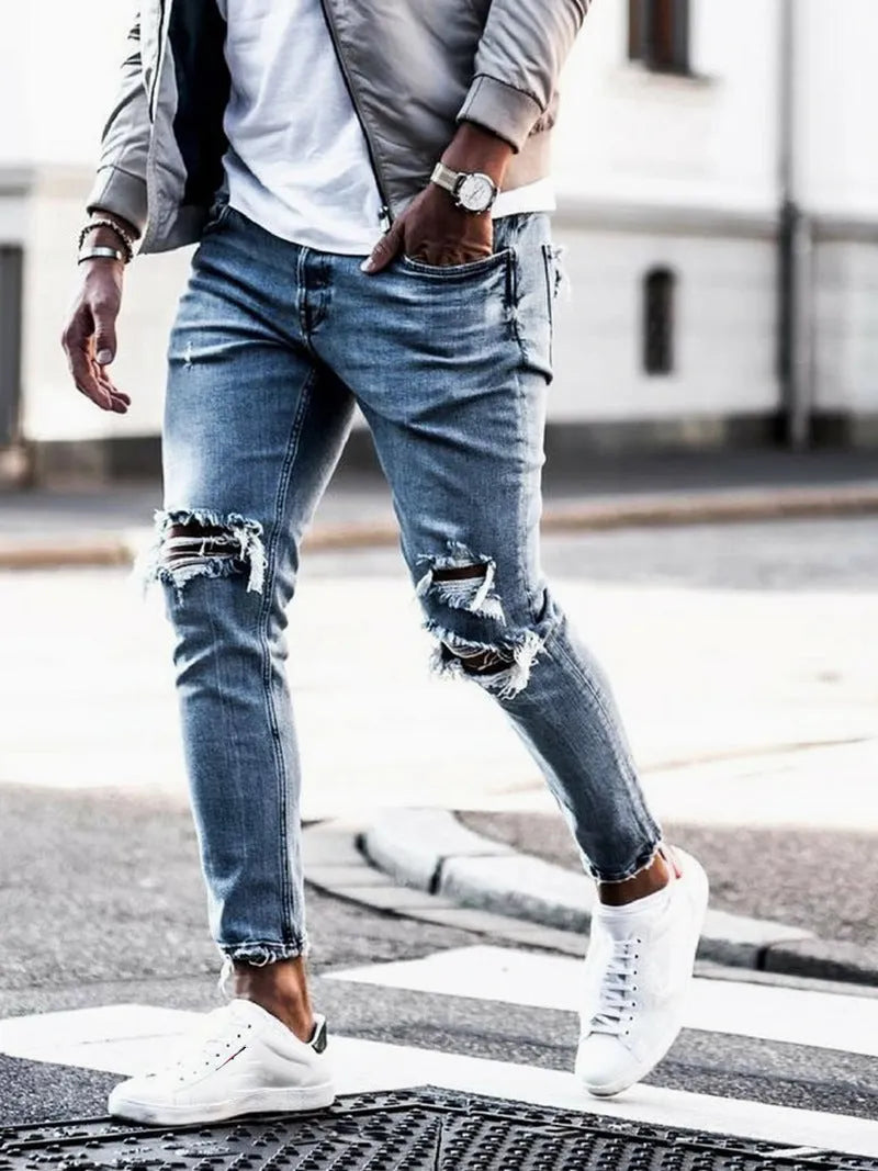 Men's light blue straight-leg distressed jeans with embroidery and washed finish, five-point length, mid-rise zip closure