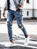 Men's light blue straight-leg distressed jeans with embroidery and washed finish, five-point length, mid-rise zip closure
