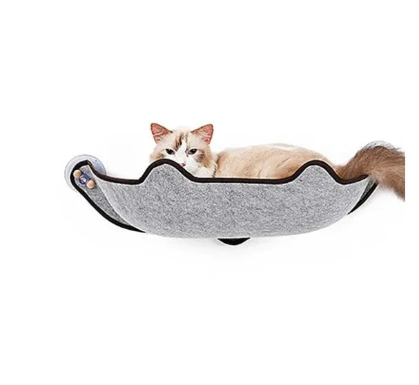 Cat sleeping on a window sill hammock made of EVA and felt cloth, secured by three 8.5cm suction cups