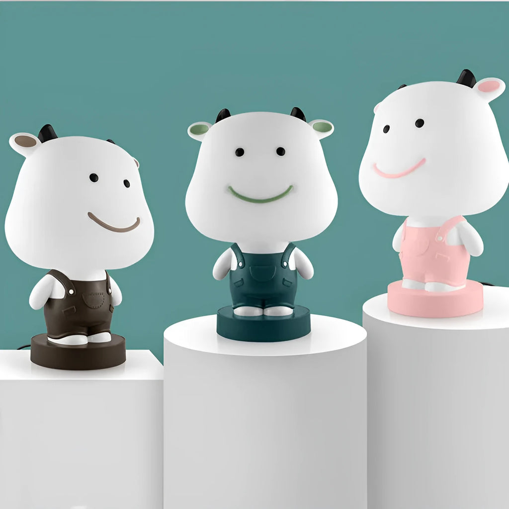 Cartoon-style animal table lamp with LED light and plastic shade in an animal design.