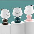 Cartoon-style animal table lamp with LED light and plastic shade in an animal design.