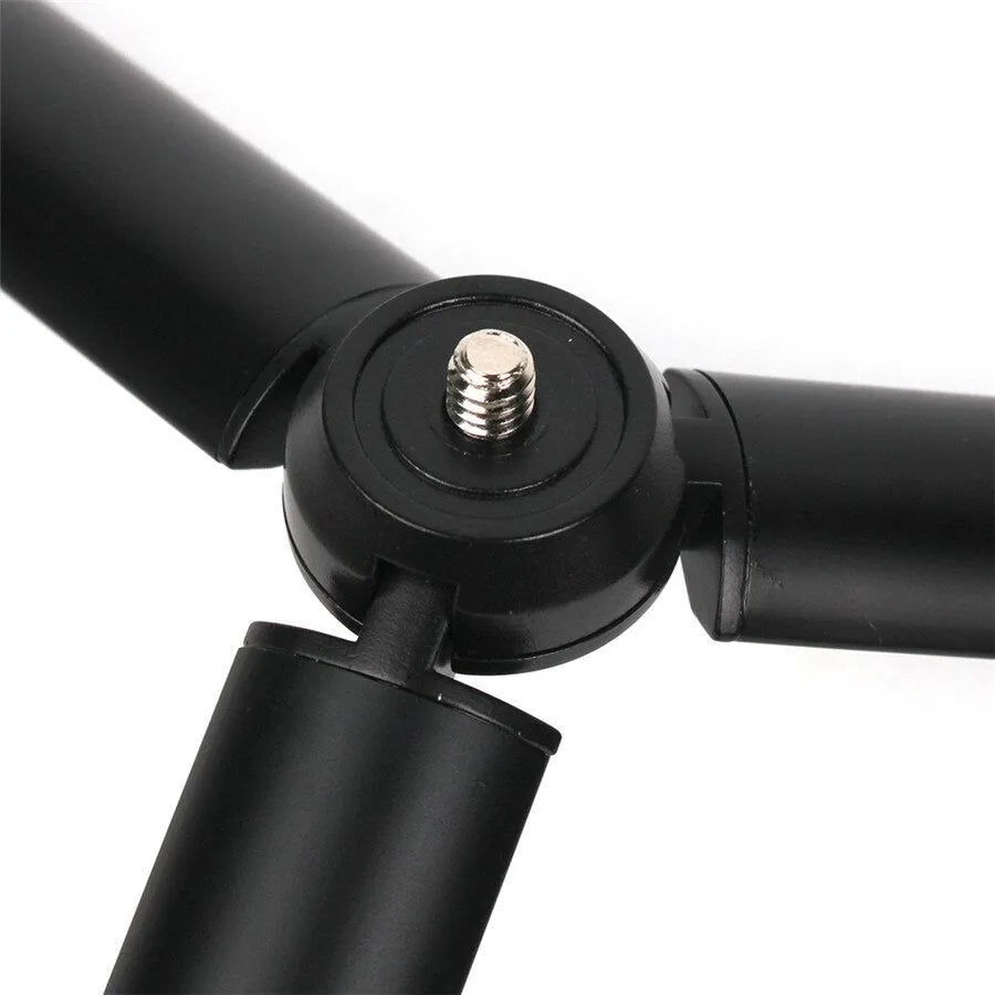 Black aluminium alloy mobile phone tripod handheld stabiliser compatible with Apple iPhone photography