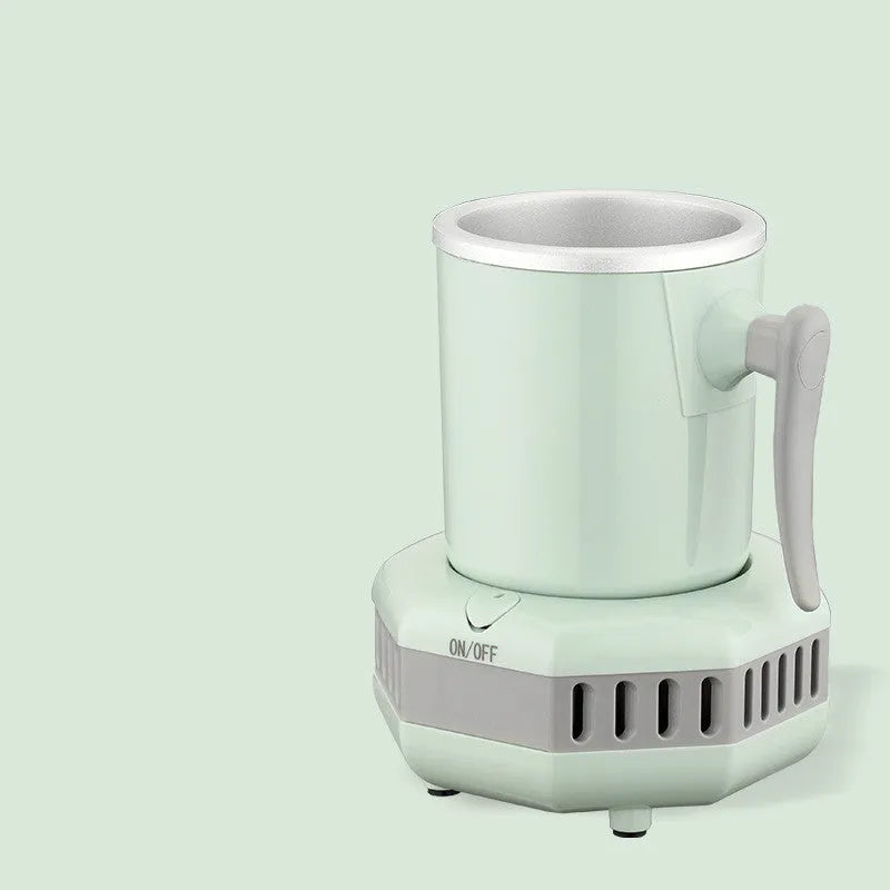 White quick-cooling aluminium cup on its electronic base station with power adapter