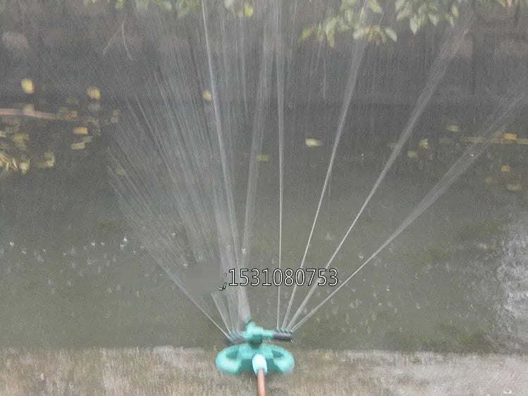 360 rotating garden sprinkler with three-fork base, 210mm x 190mm x 95mm, sprays up to 3m high and 5m wide