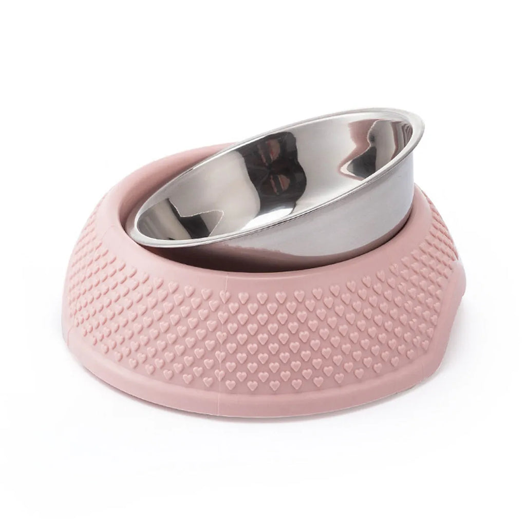 Blue stainless steel pet bowl with non-slip base on a floor.