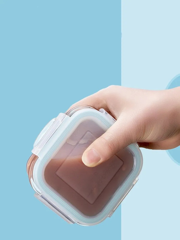 RREIAO infant food supplement box 160ml glass with blue silicone PP lid on white background