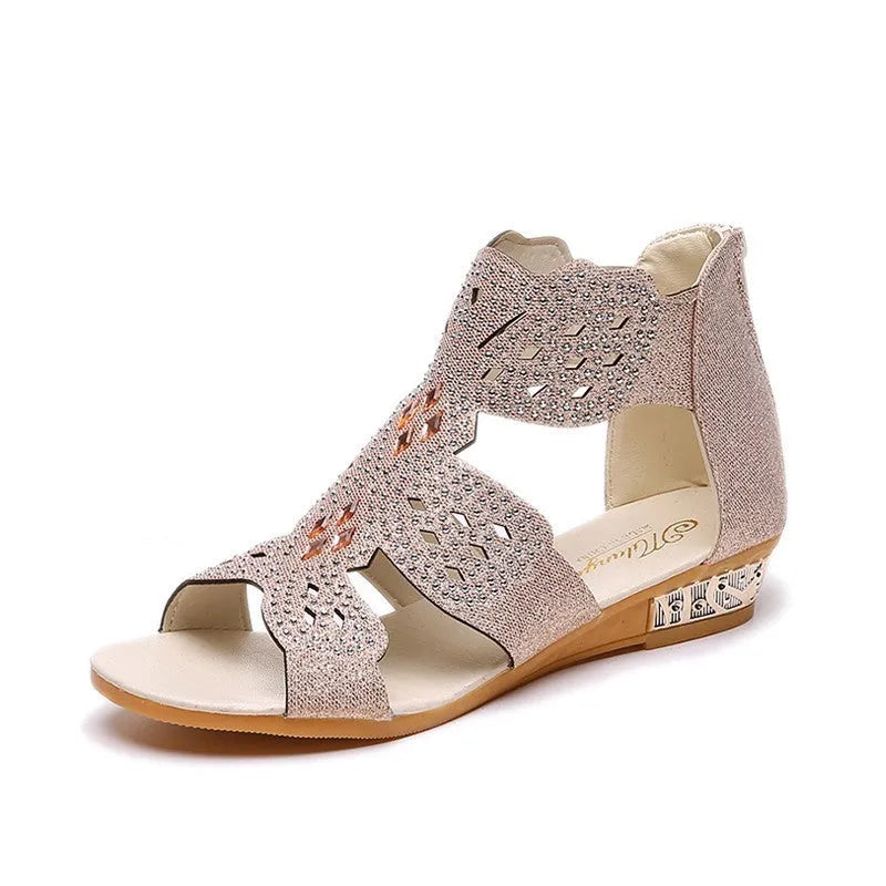 Women's flat open toe sandals with rhinestone detail and back zipper in beige colour
