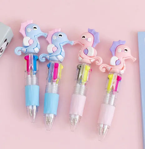 Four-colour press ballpoint pen with a random cute cartoon design, such as cactus or fast food, showing its press mechanism.