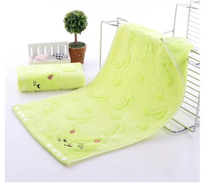 Set of four bamboo fiber kitten face bath towels in blue, green, pink, and yellow, each 25x50cm