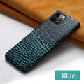 Black leather iPhone case with a crocodile pattern texture, shown fitted on a compatible phone.
