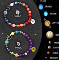 Two natural stone beaded bracelets on elastic string showing zodiac sign beads