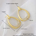 Yellow gold geometric drop earrings with zircon accents measuring 2.6cm x 1.7cm
