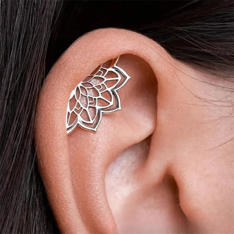 Spider web geometric mesh stud earrings in gold or silver electroplated metal for horror Halloween jewellery