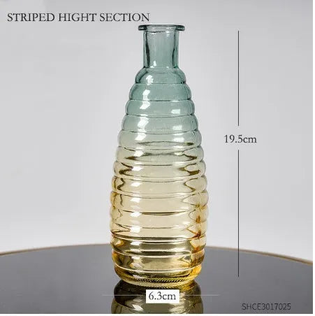 Set of five clear glass vases with colourful electroplated finish and thicker stable bottoms in various sizes