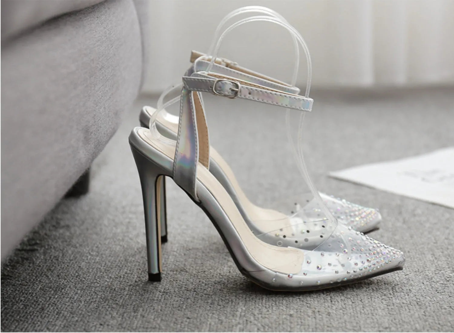 Women's pointed toe stiletto sandals with diamond details on a PVC upper, showcasing a 9cm heel.