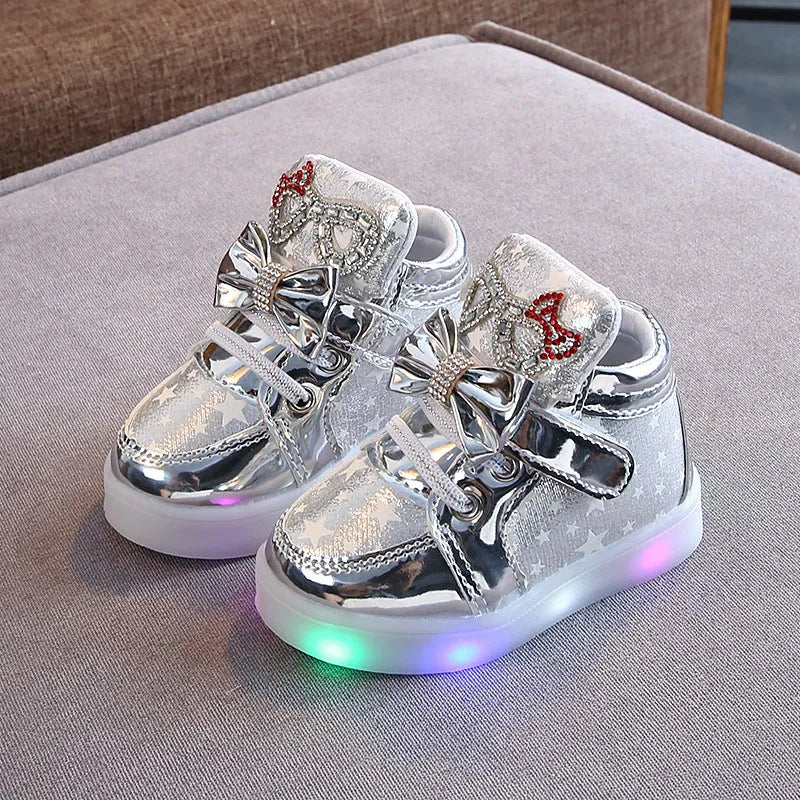 Children's LED light up shoes with magic button in golden, pink, and silvery colours