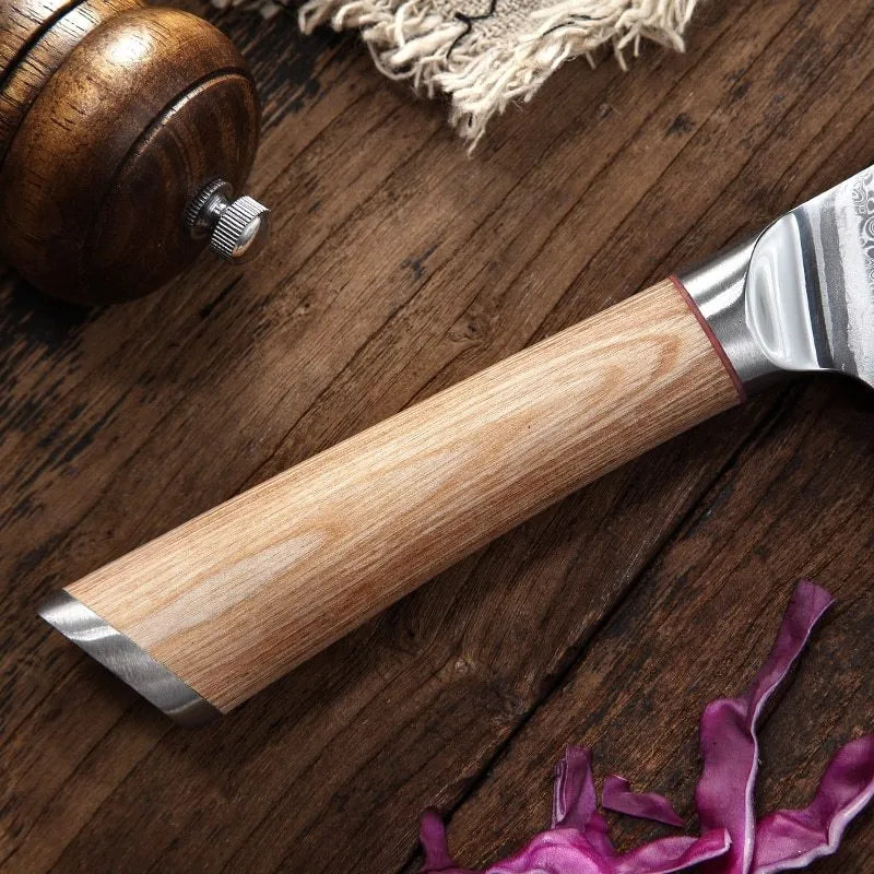 Damascus pattern kitchen knife set with V gold steel core showing 67-layer folded construction