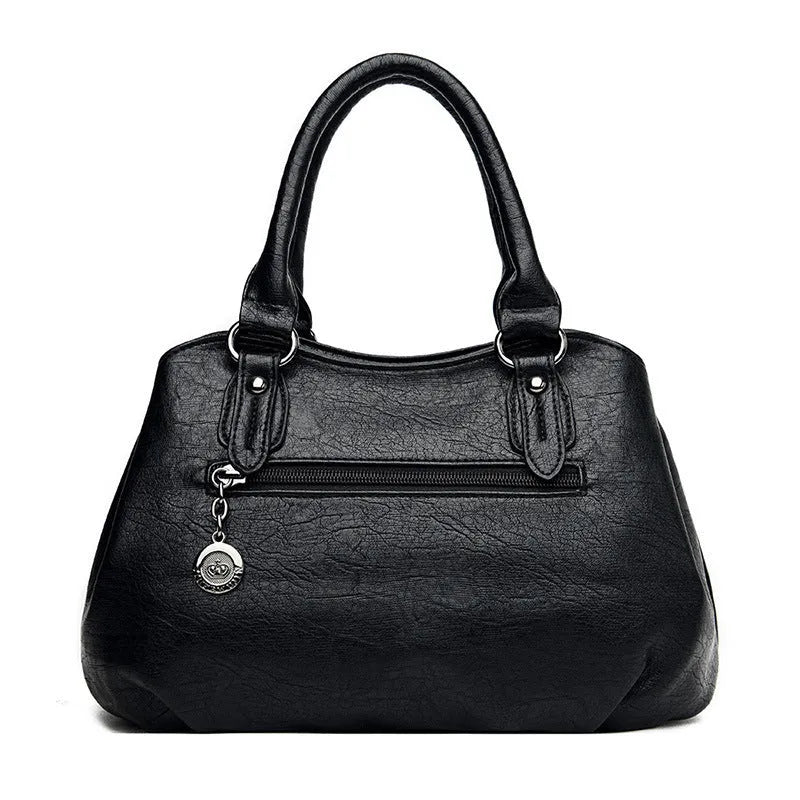 Large capacity crossbody backpack in dumpling shape with PU material and visible sewing line detailing