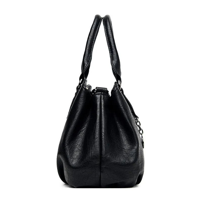 Large capacity crossbody backpack in dumpling shape with PU material and visible sewing line detailing