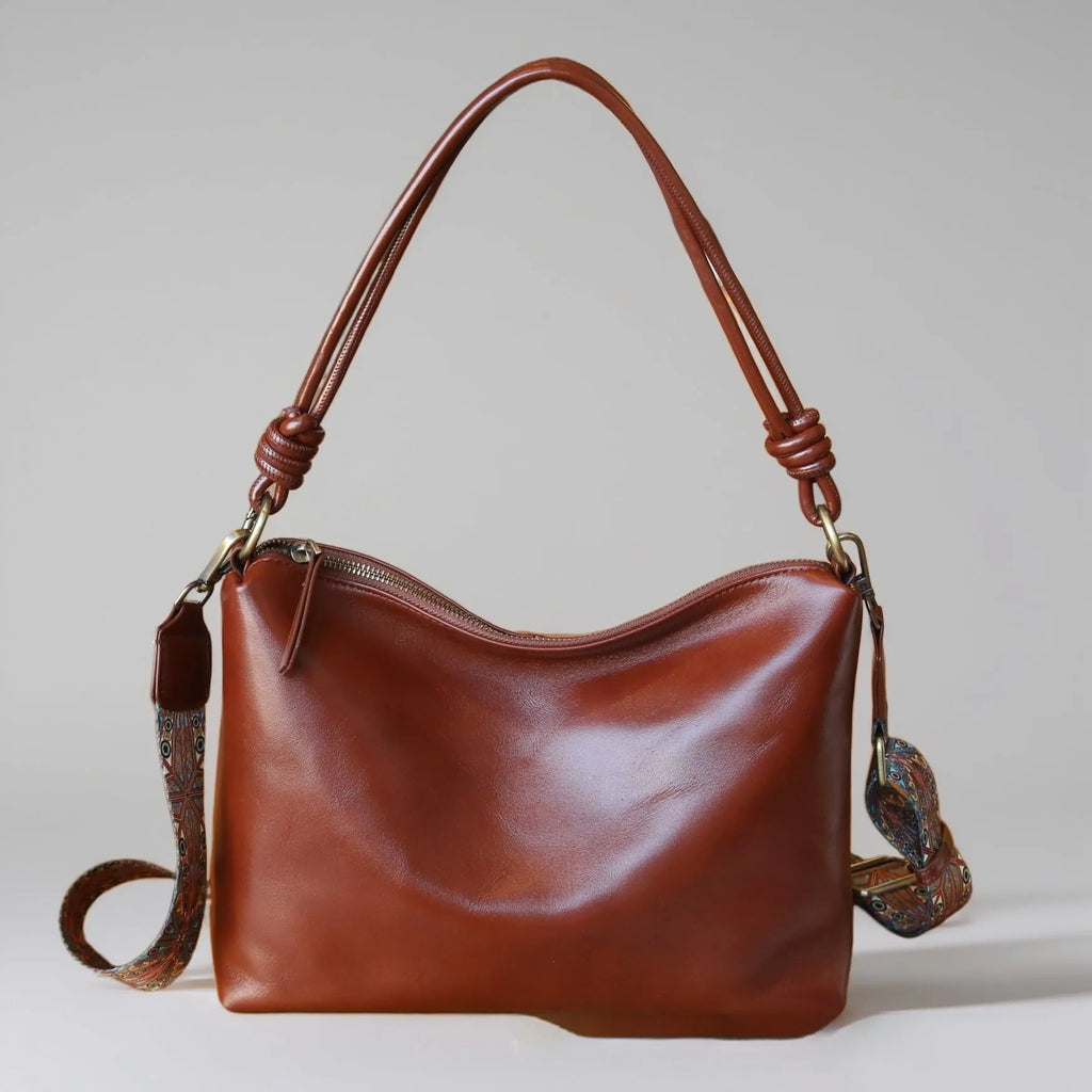 Genuine leather creative large capacity pillow-shaped shoulder bag in black with double straps and top grain leather finish
