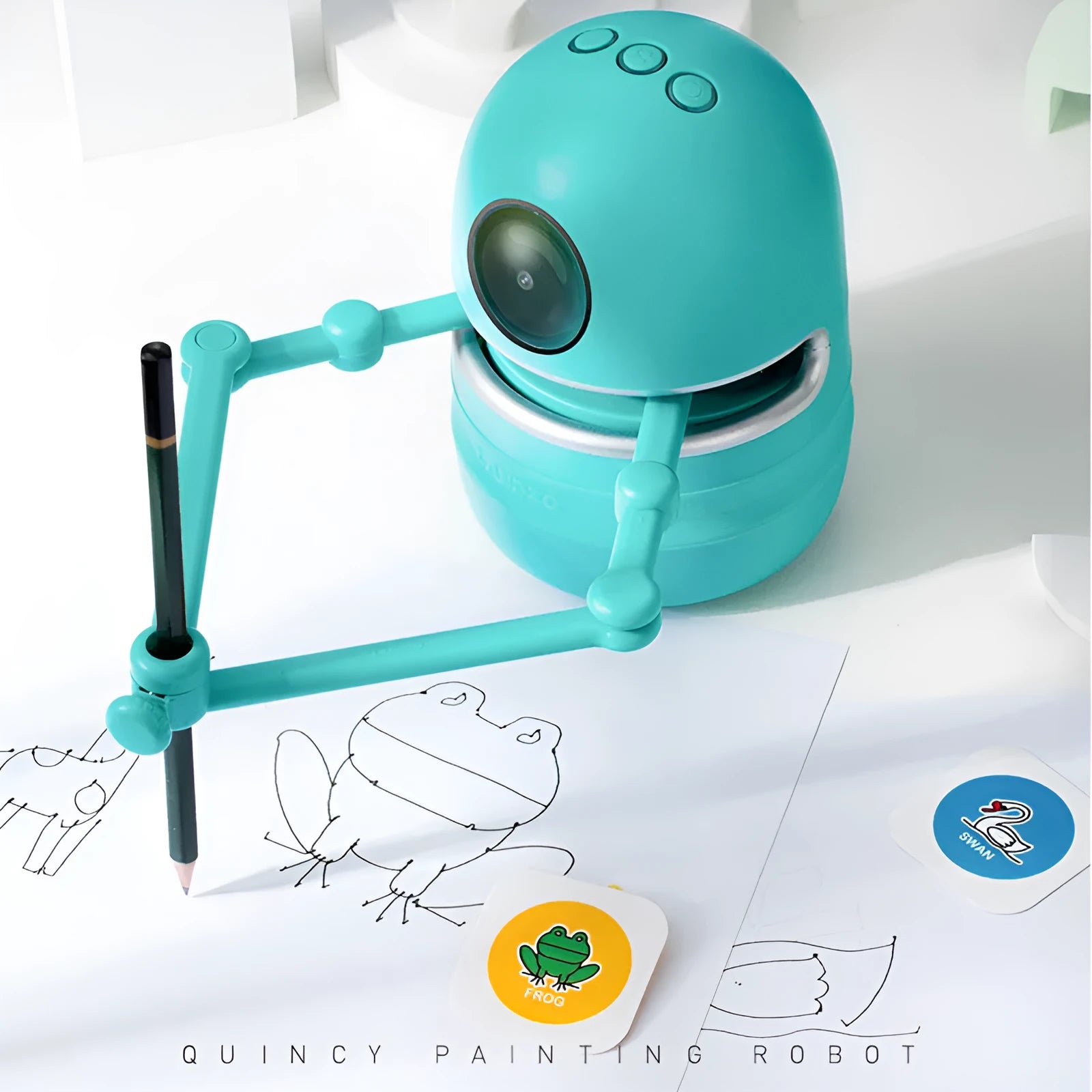 Children painting robot with English voice guidance on a table, showing drawing cards and suction cup base