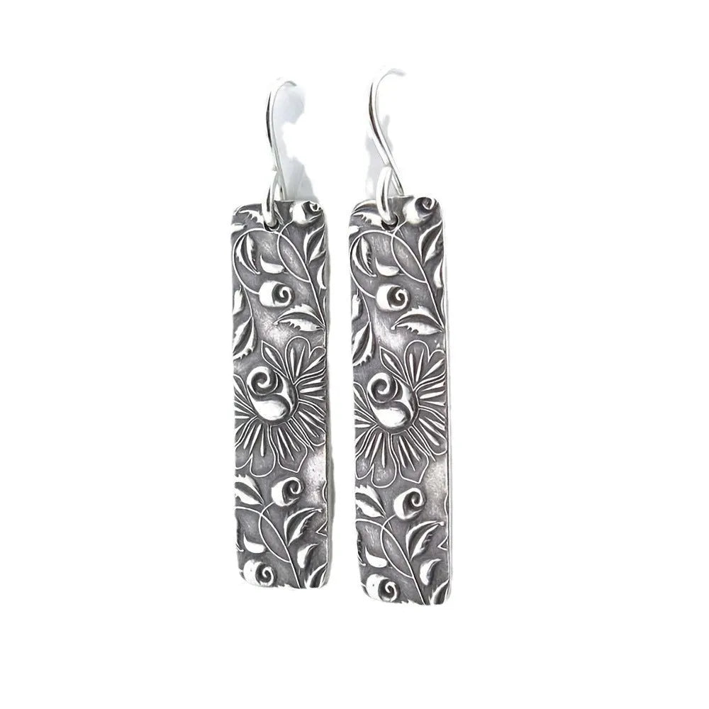 Long silver geometric earrings with carved vine design and retro European American style