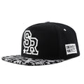 Adjustable cotton baseball cap in black and white colours with dome crown
