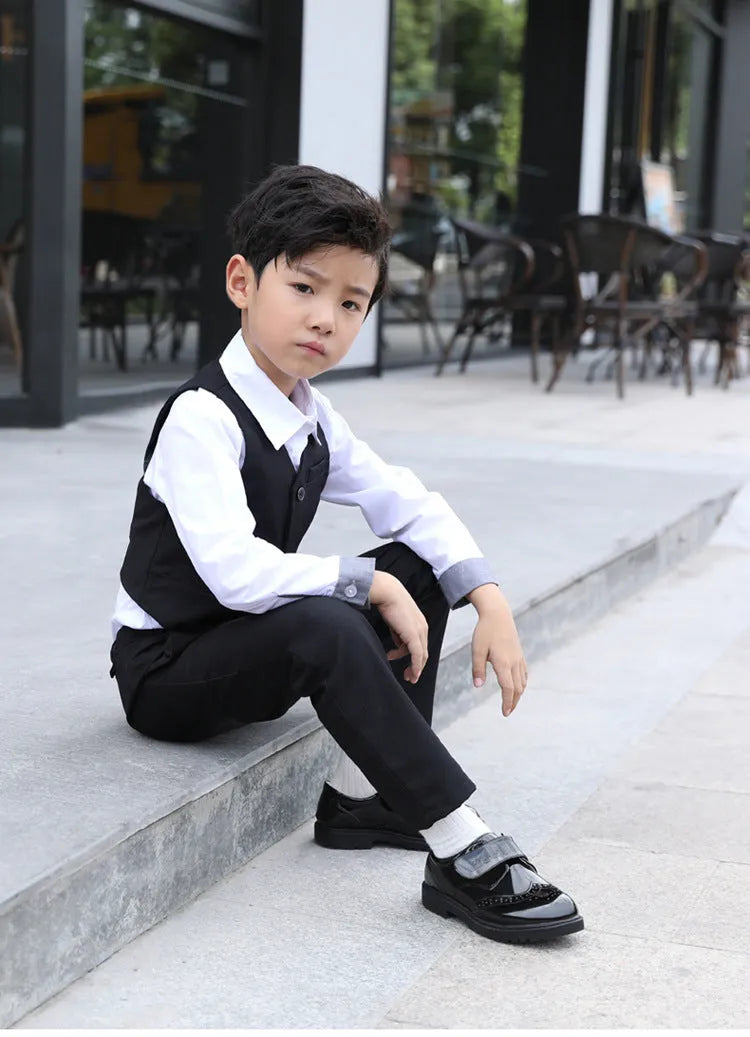 Boys black campus shoes with artificial PU upper and rubber sole, lace or Velcro fastening, sizes 26-42