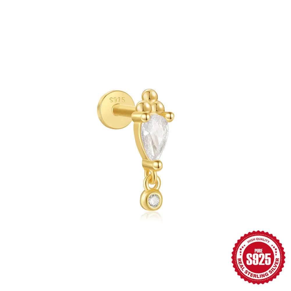 Sterling silver ear stud with a hanging gold-tone tassel charm on a white background.