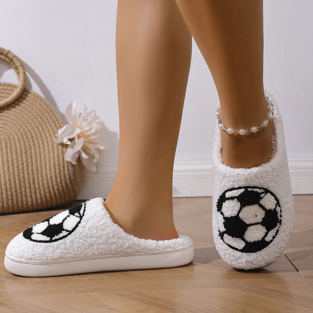 White thermal cotton slippers with ethnic totem pattern, plush upper, and TPR sole on a floor