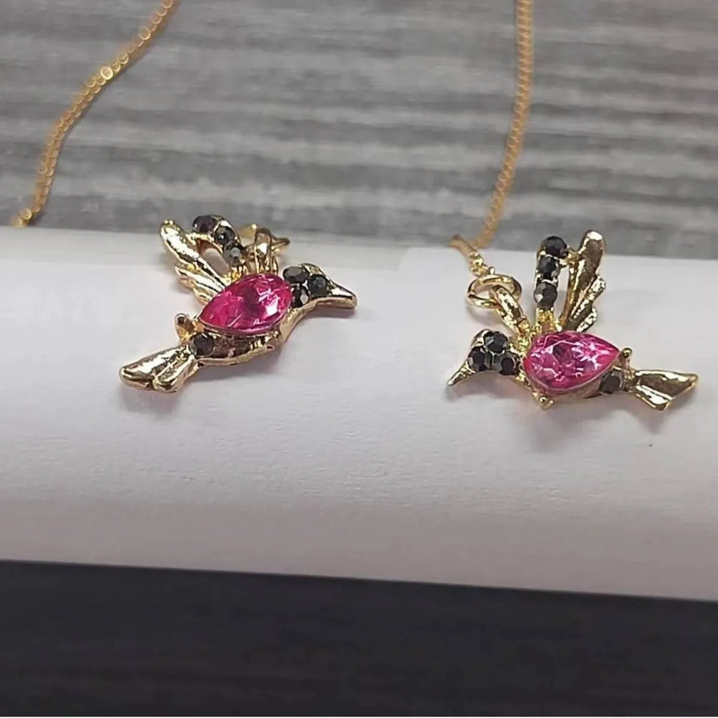 Women's long hanging earrings with bird motif in red, blue, or red lvzuan electroplated alloy.