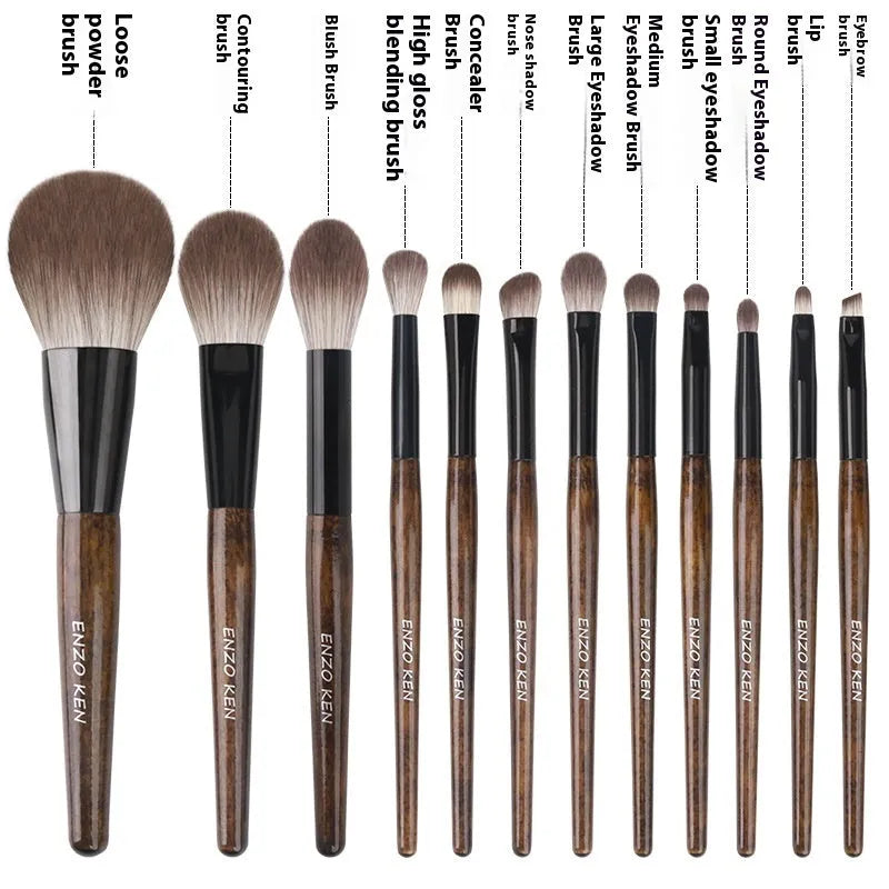 12-piece makeup brush set with wooden handles displayed in open PU brush roll