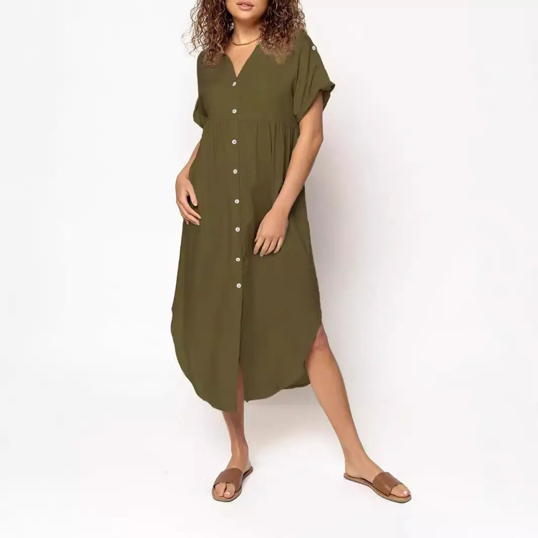 Loose-fitting casual midi dress with buttons down the front, shown in a solid colour.