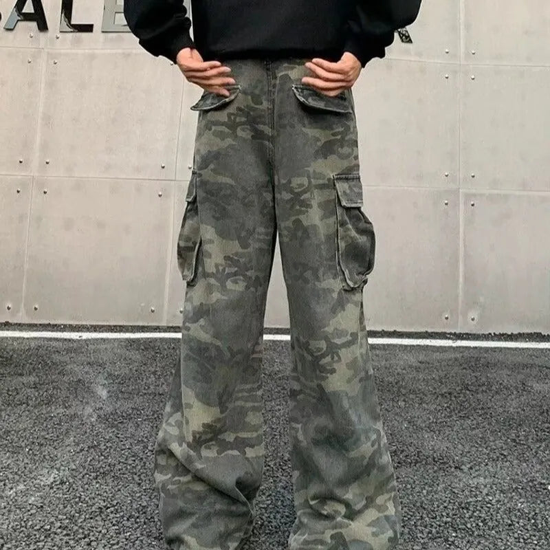 American Vintage camouflage cargo pants with multiple pockets and a washed, crumpled fabric texture.