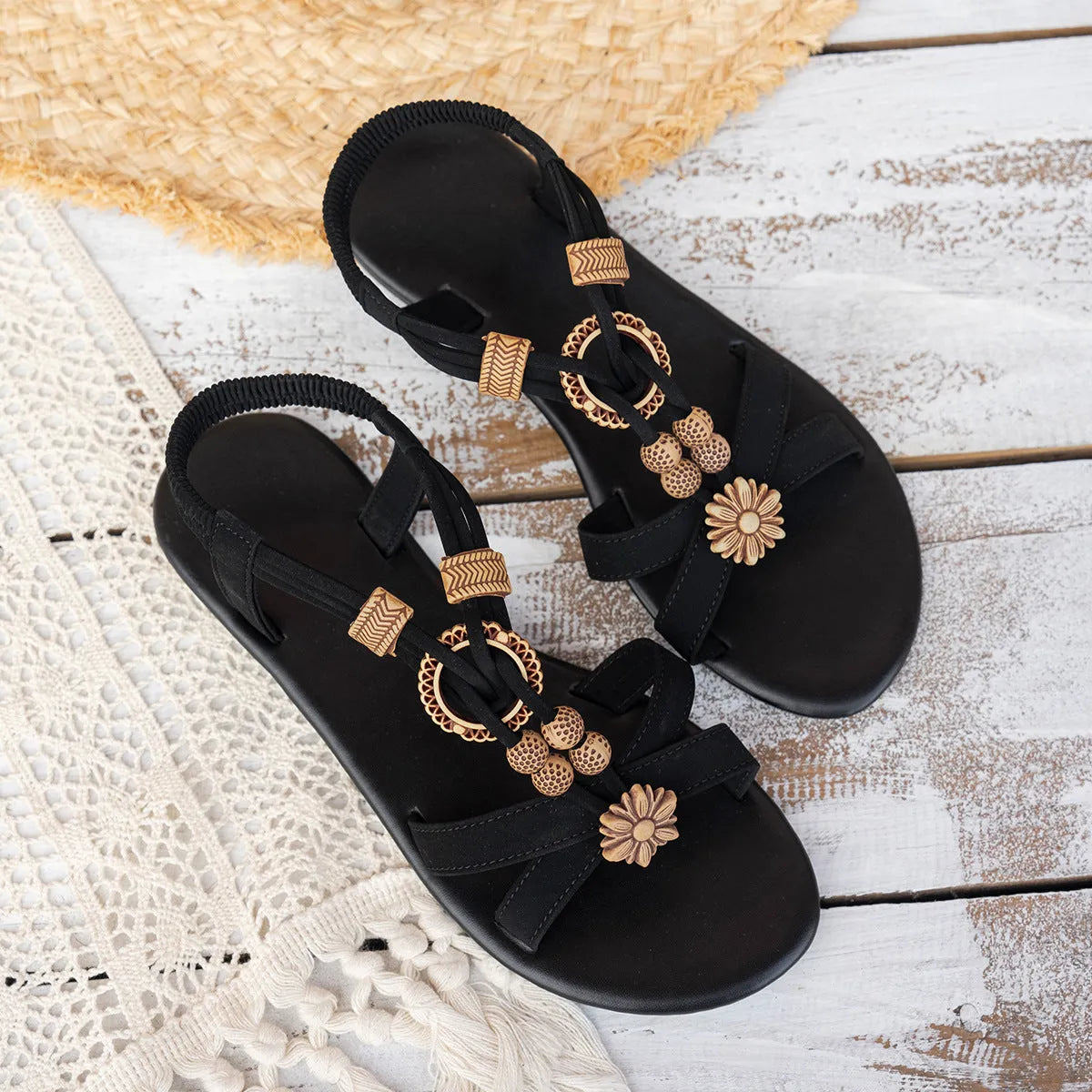 Black ethnic style women's sandals with elastic band, rhinestone decoration, and open toe design