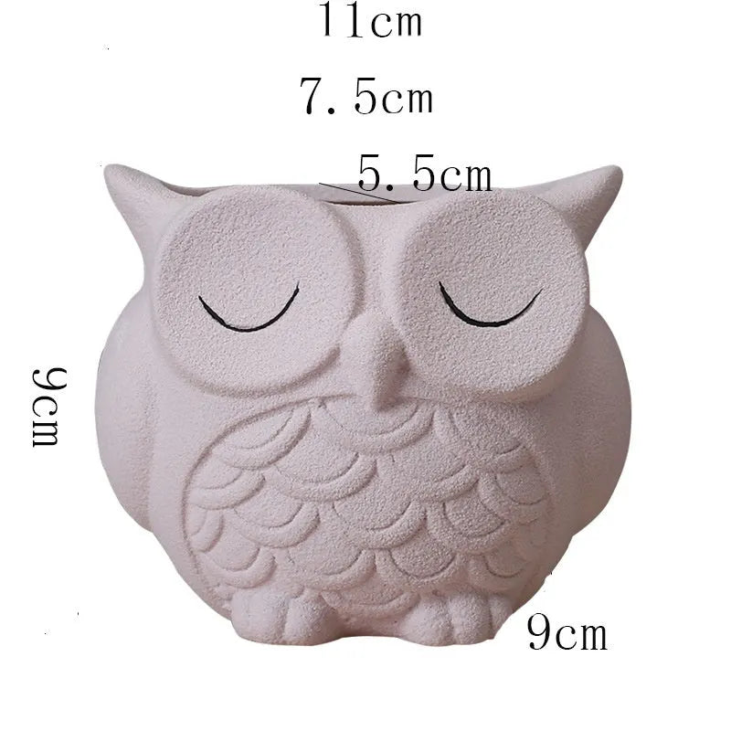 Handmade ceramic succulent pot with cartoon owl design in frosted pastel colour