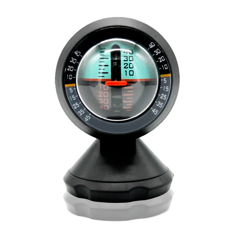 Black vehicle mounted slope meter for measuring car inclination and elevation angles on dashboard.