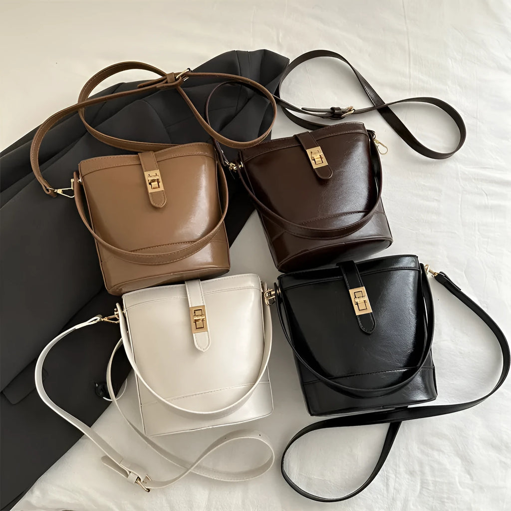 Women's one shoulder crossbody bag bucket shape in PU leather, available in black, brown, khaki, white. Width 19cm height 18.5cm.