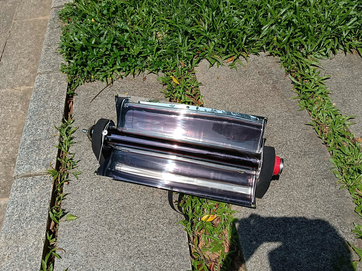 Silver portable vacuum tube grill with 1.5L capacity, 620mm tube, 49x35cm reflector, for outdoor smokeless cooking.