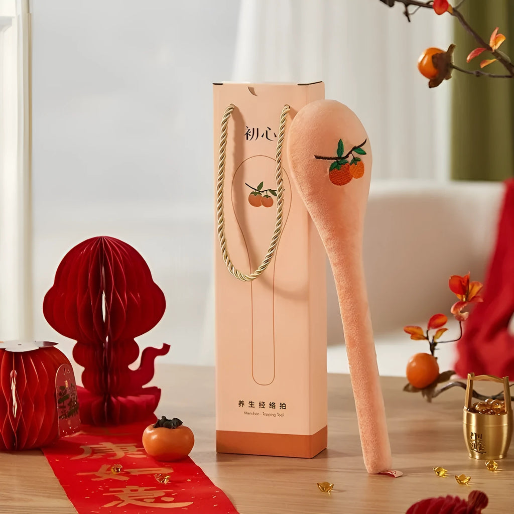 48 cm persimmon colour percussion massage stick with meridian flap design