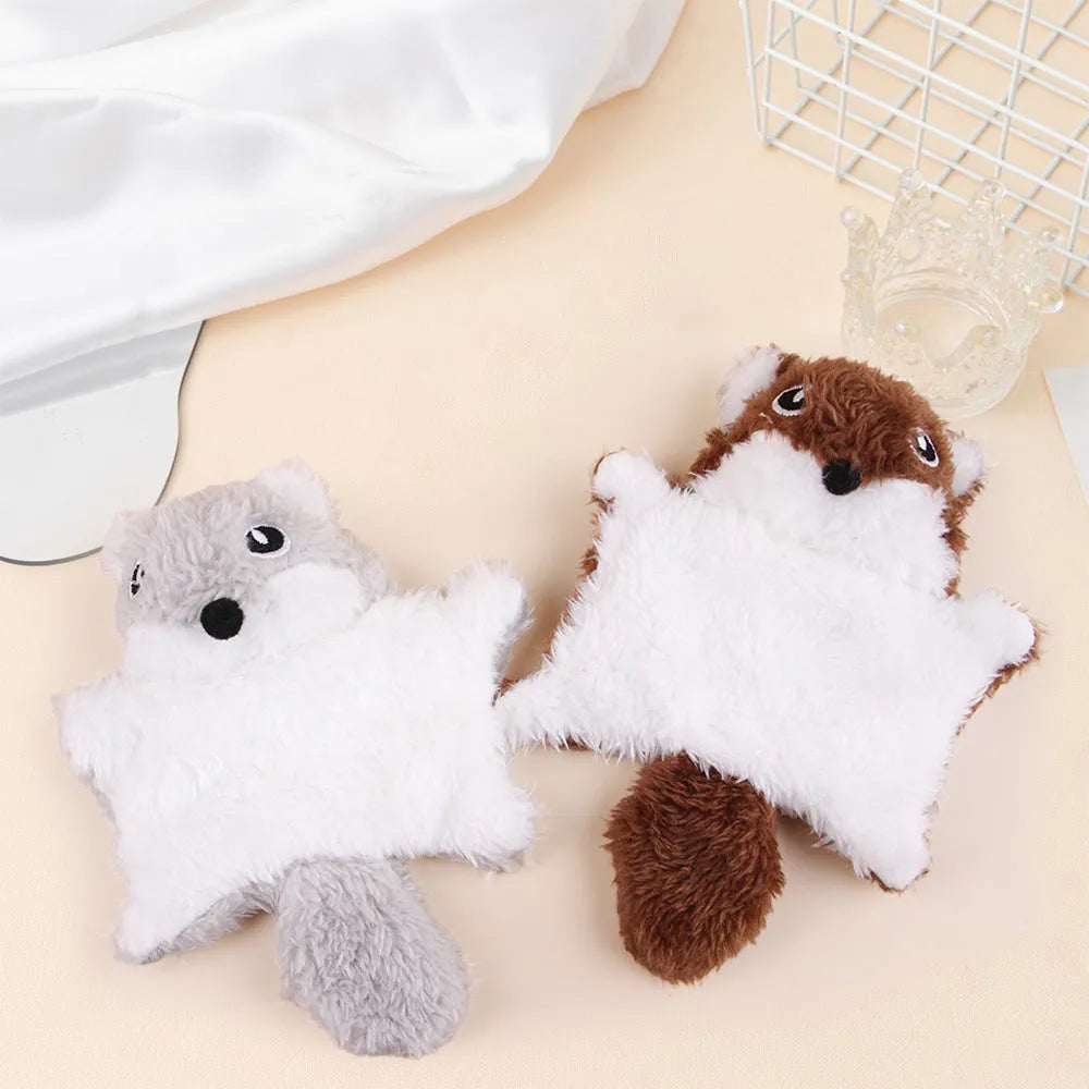 Plush flying squirrel cat teaser toy in brown and grey with ringing paper sound, on a plain background