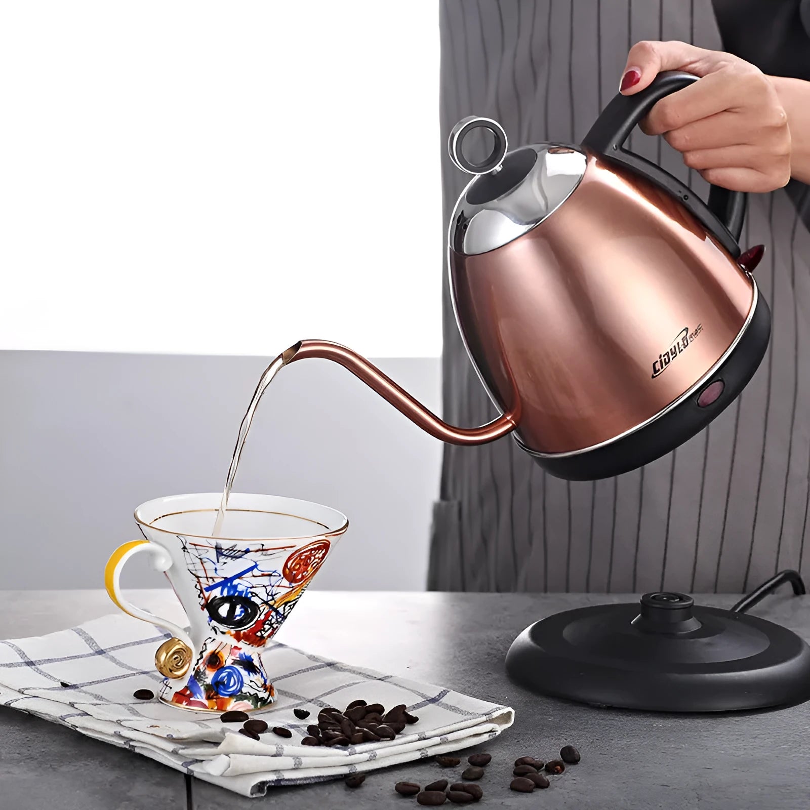 White stainless steel electric kettle with touch controls and 1L capacity