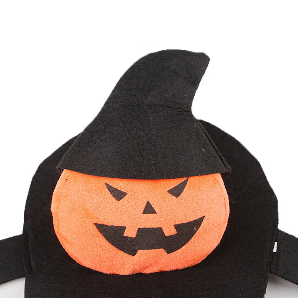 Orange and white Halloween dog costume depicting a pumpkin ghost on a small dog.