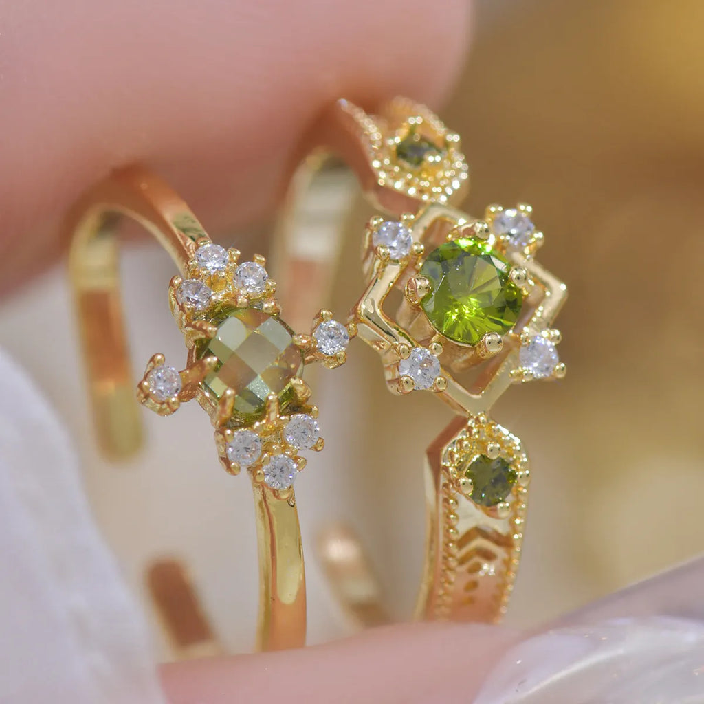 Open mouth geometric ring with round zircon stones on copper band, available in purple or olive green