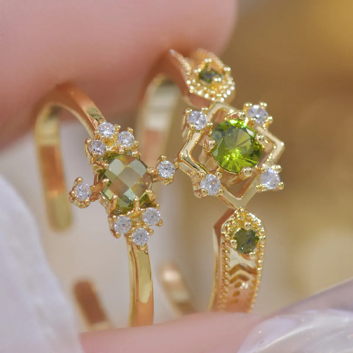Open mouth geometric ring with round zircon stones on copper band, available in purple or olive green