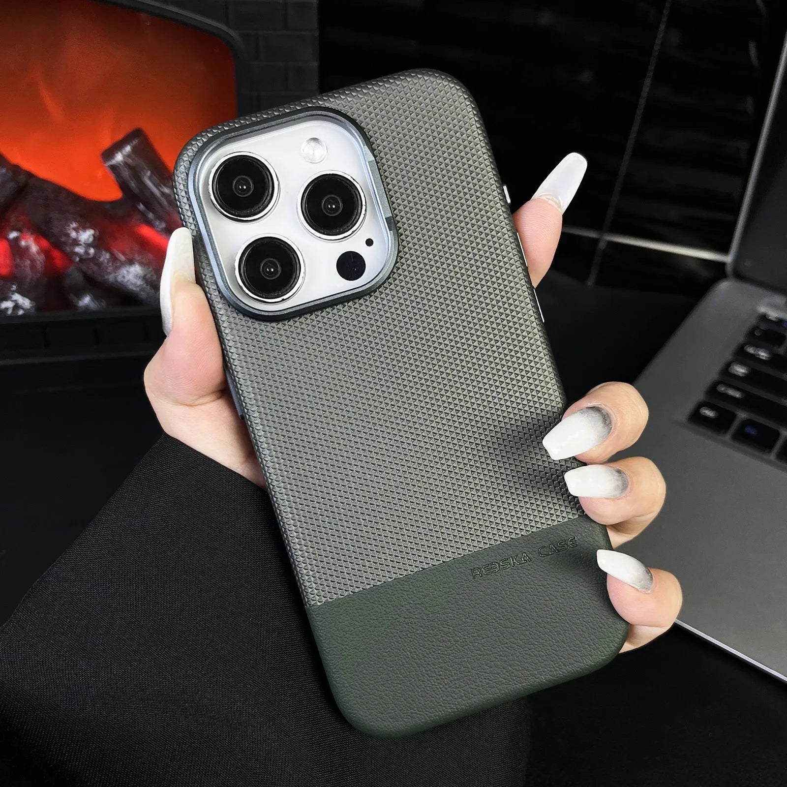 Magnetic iPhone case with dragon scale texture and leather stitching in black colour