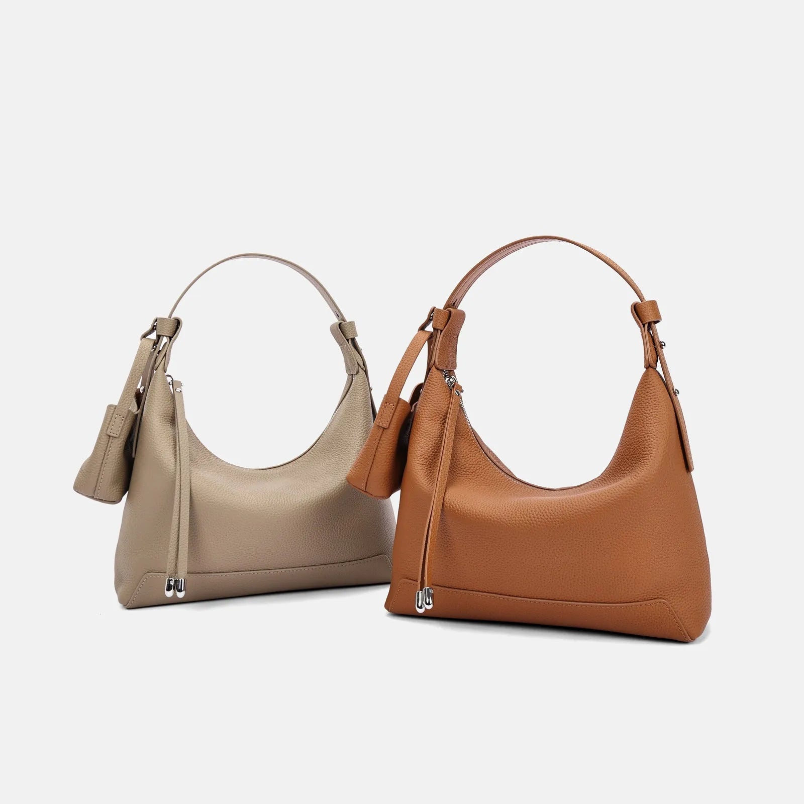 Genuine cowhide leather women's shoulder bag in urban simplicity style, shown in soft construction.