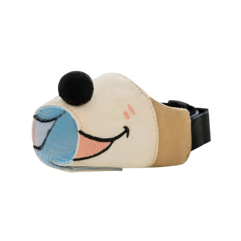 Canvas dog muzzle in Ollie Brown Bear pattern, showing adjustable straps and open design for breathability.