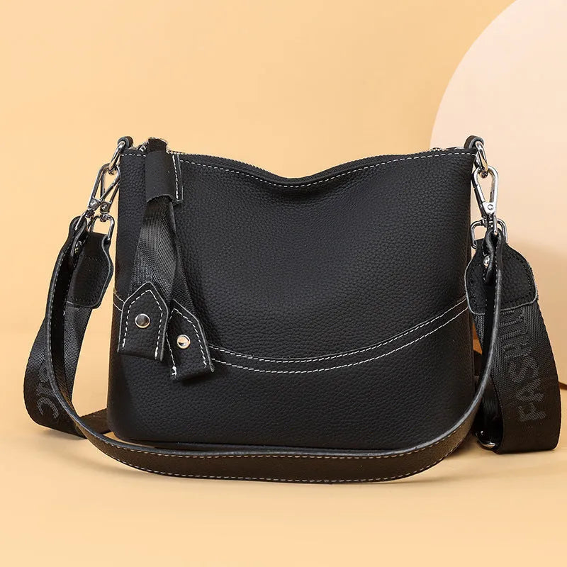 Genuine leather horizontal square crossbody bag with inner patch pocket, available in black, brown and khaki